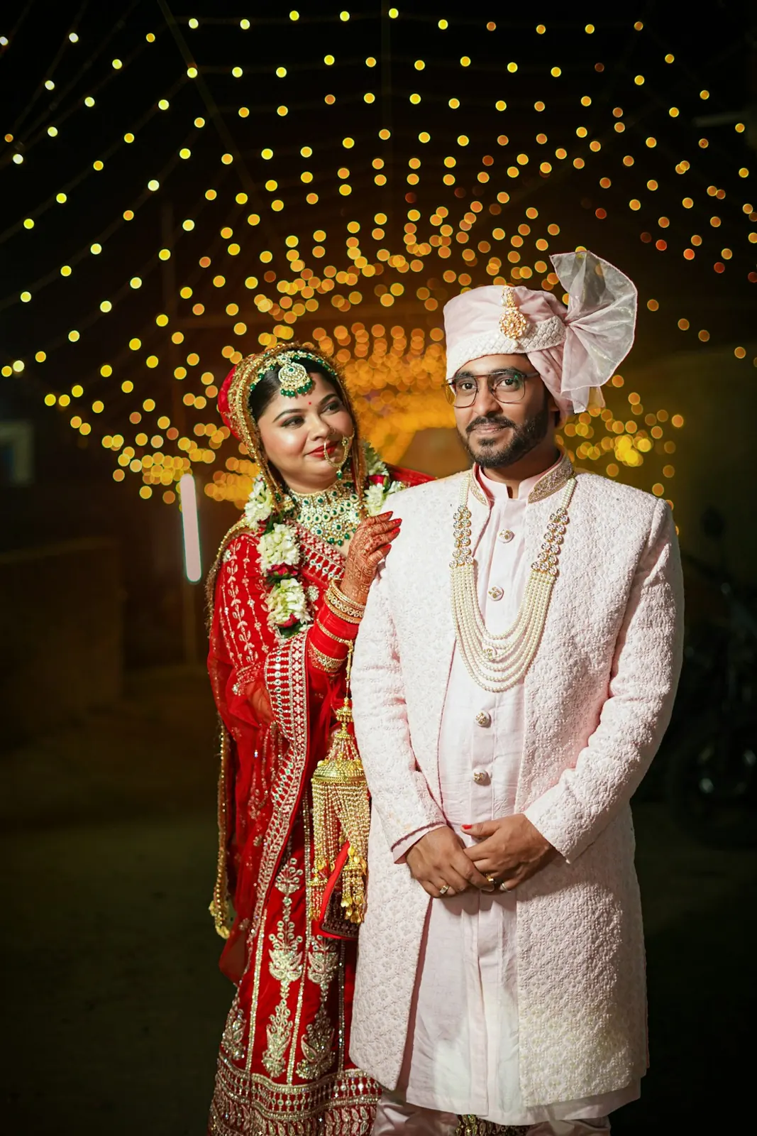 Bride and groom portrait in traditional wedding attire
